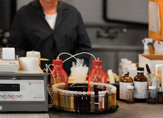 Clark prepares and analyzes samples of engine oil, hydraulic fluid, diesel fuel, gasoline and jet fuel used by laboratories around the world to confirm that their testing meets ASTM standards.