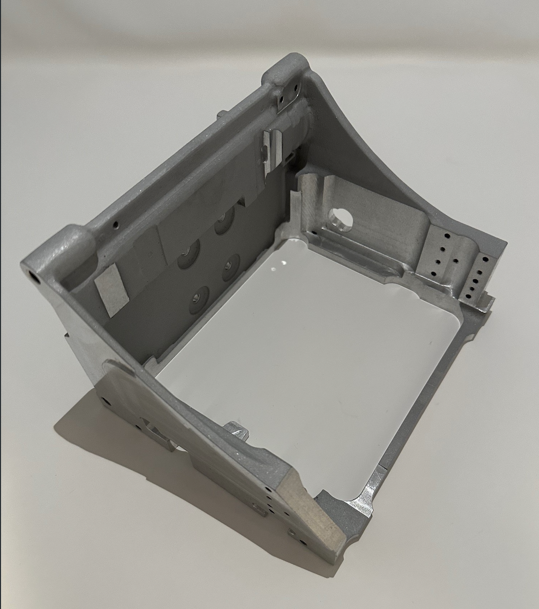 A muti-part machined assembly converted to a casting eliminating assembly, and welding.  Application is a frame to hold the head of a 3D printer.